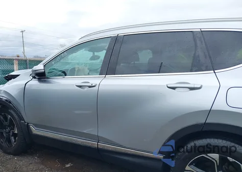 2017 Honda Cr-V Touring z USA, uszkodzony, nr VIN 5J6RW2H96HL019130